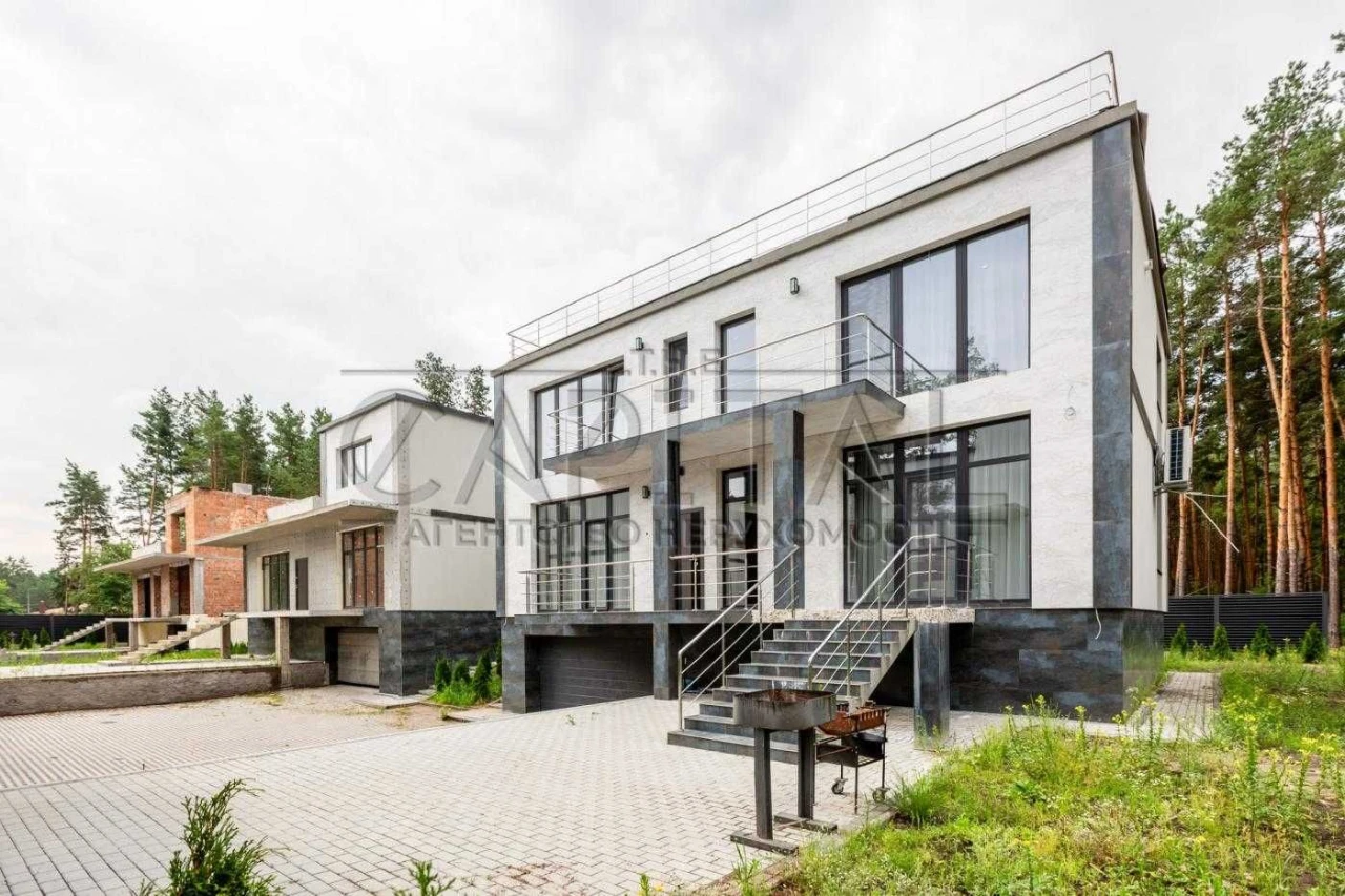 Сучасний будинок преміум-класу 400 м² з басейном та панорамн