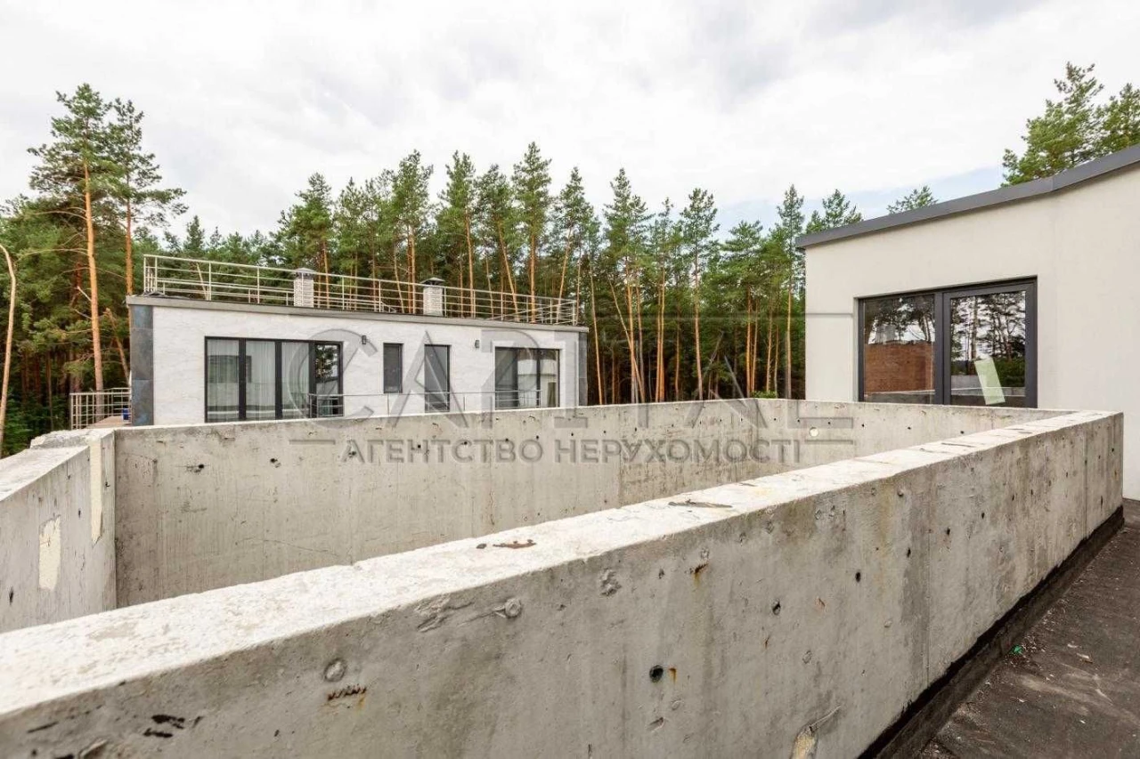 Сучасний будинок преміум-класу 400 м² з басейном та панорамн