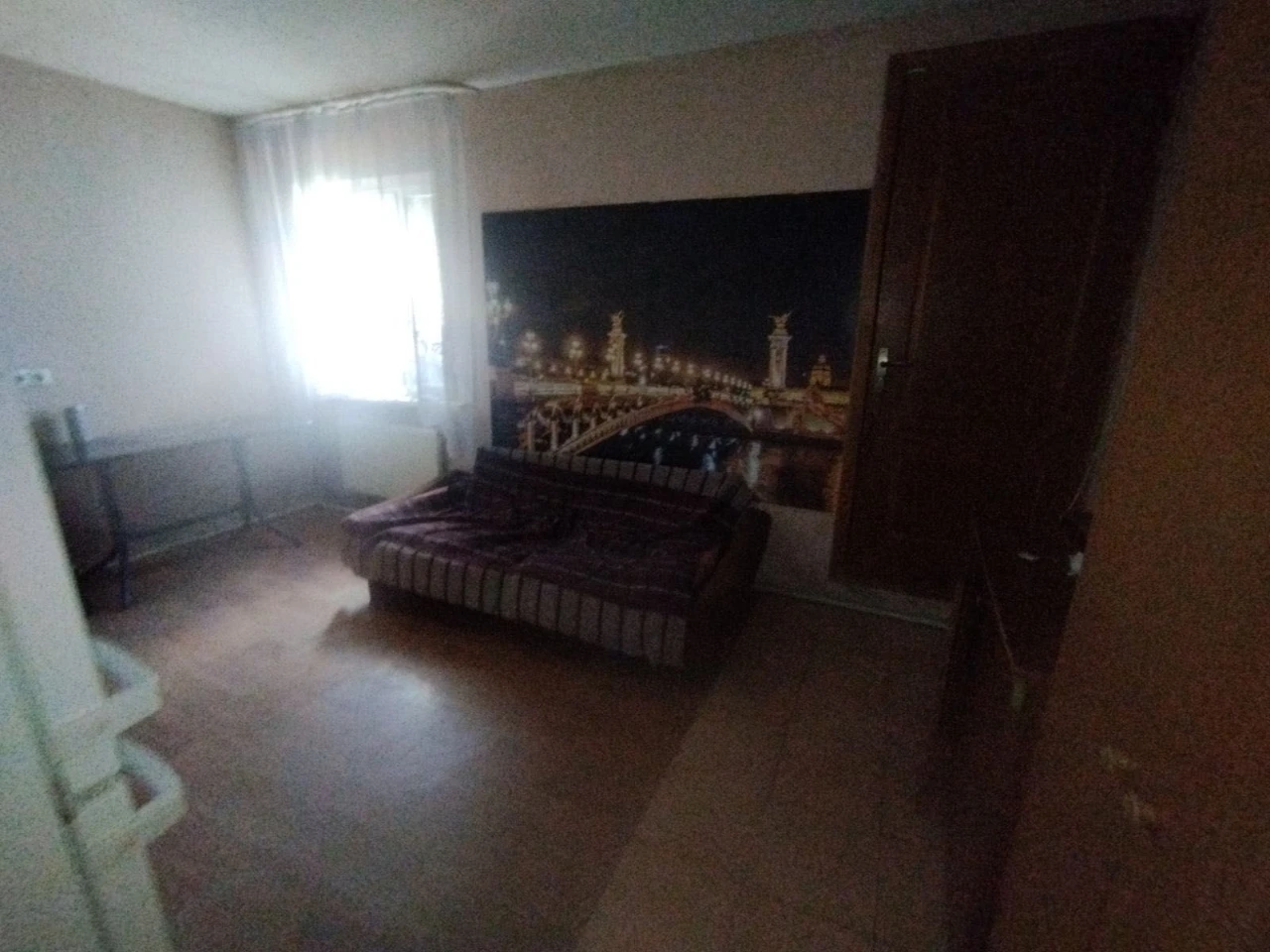 Половина будинку та земельна ділянка