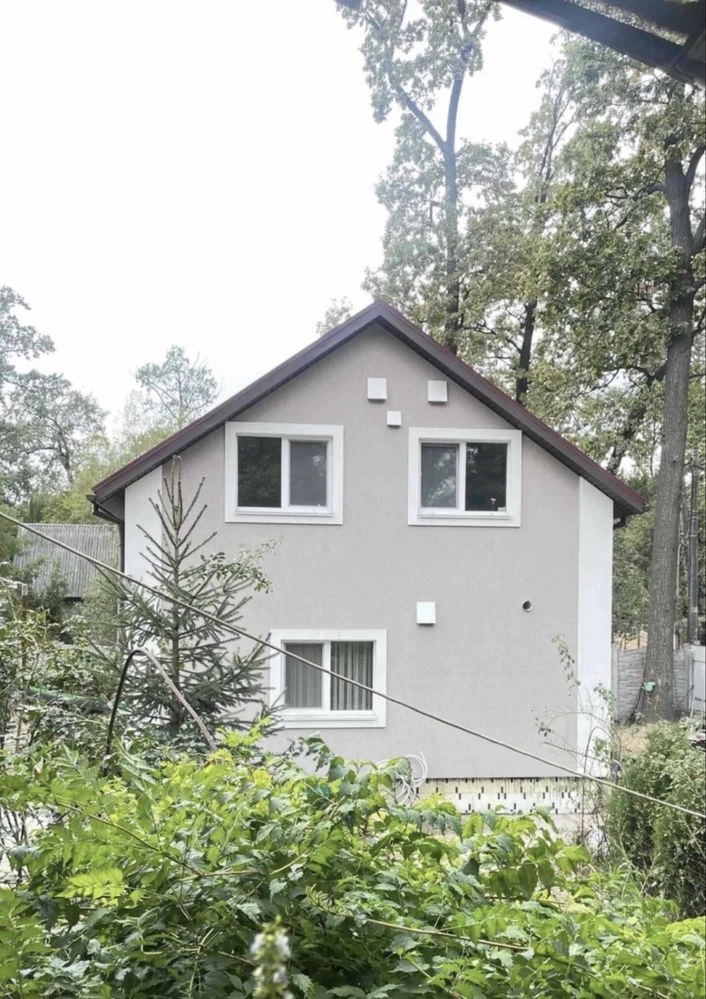 House for sale in a pine forest in a cozy location