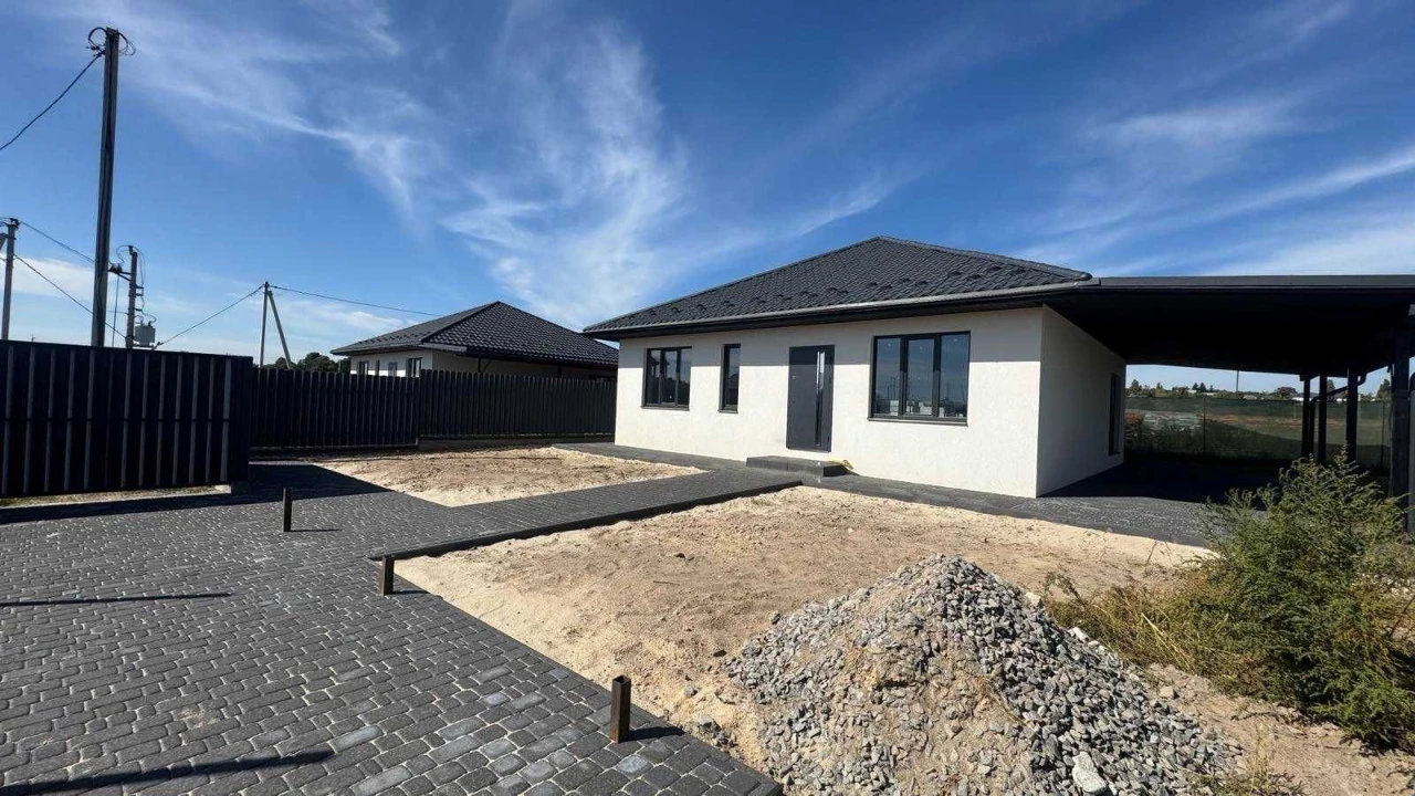 Sale of a ready-made house with a terrace on 5 acres in the suburbs
