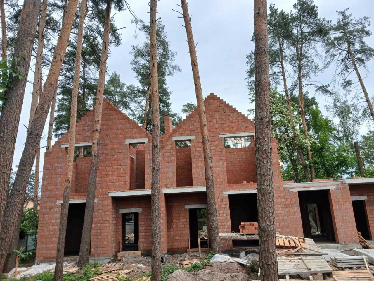 Brick Townhouses in Irpin in a Forest Green Zone