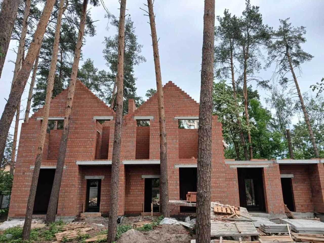 Brick Townhouses in Irpin in a Forest Green Zone