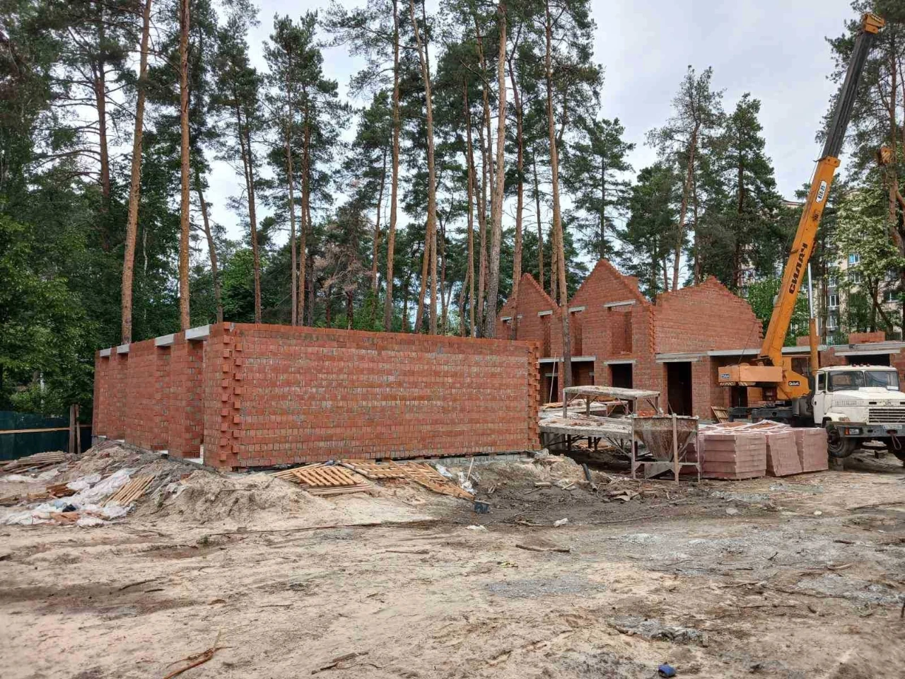 Brick Townhouses in Irpin in a Forest Green Zone