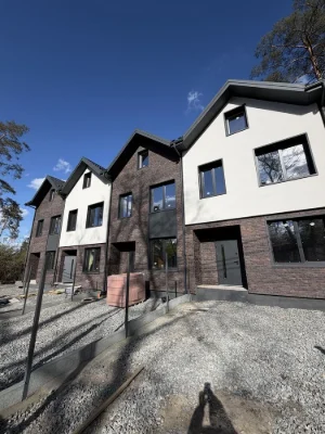 Ready townhouse with front yard and central utilities