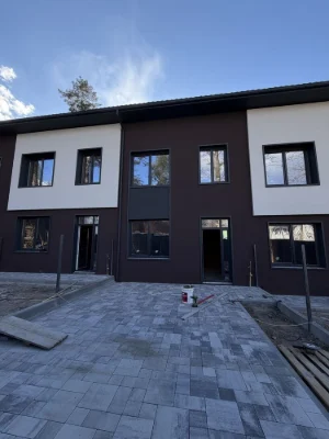 Ready townhouse with front yard and central utilities