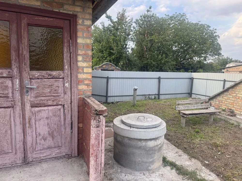 Продаж пів будинка в центі Кагарлика