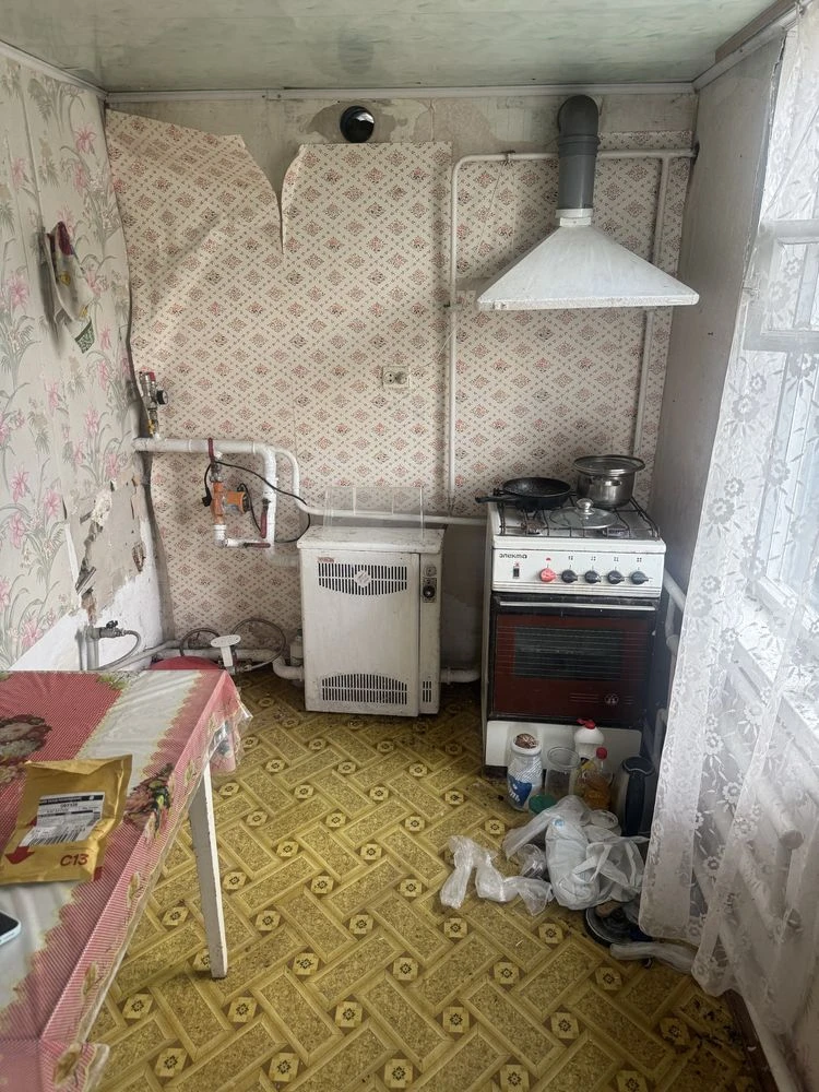Продаж пів будинка в центі Кагарлика