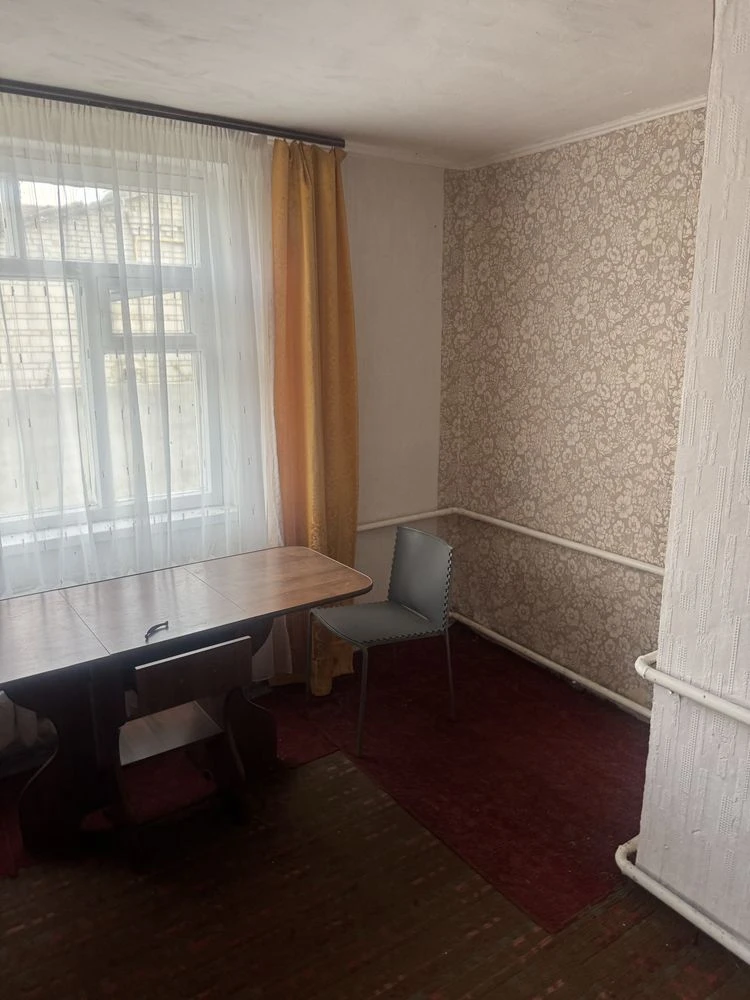 Продаж пів будинка в центі Кагарлика