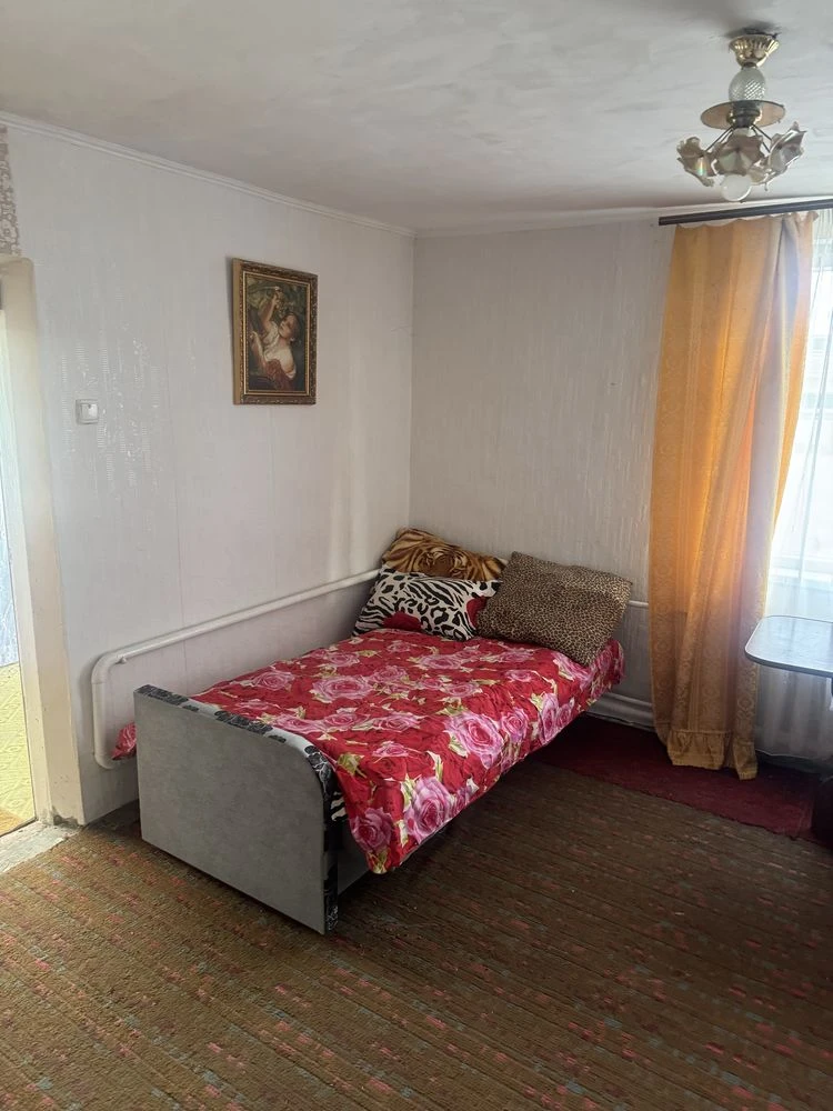 Продаж пів будинка в центі Кагарлика