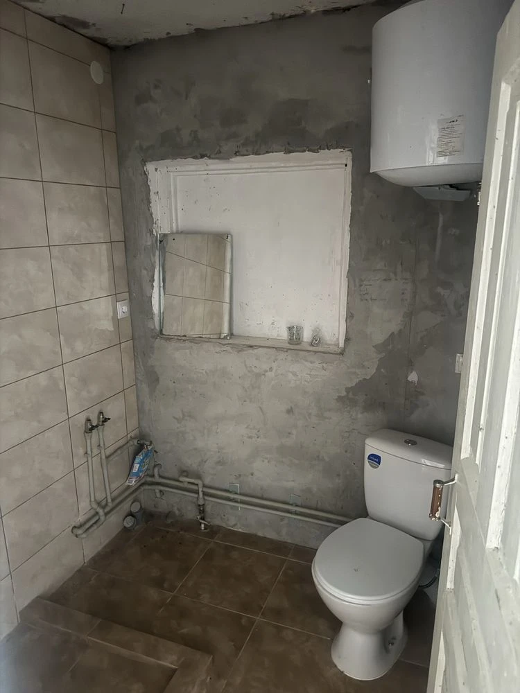 Продаж пів будинка в центі Кагарлика