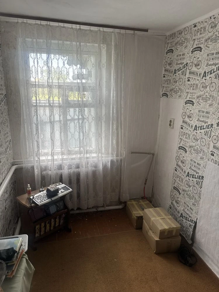 Продаж пів будинка в центі Кагарлика