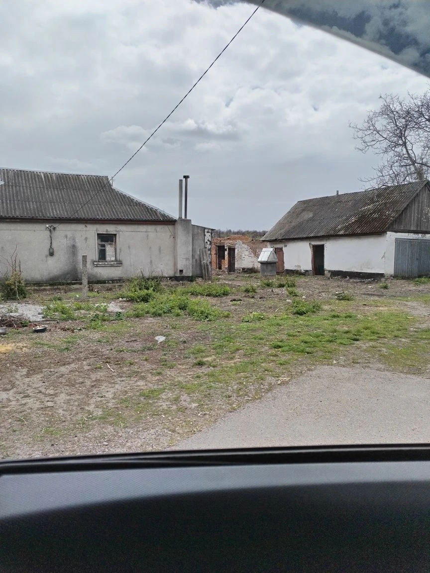 Ділянка центер  міста 17 соток  з хатою