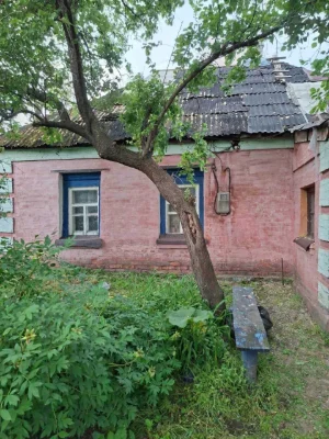 Продам будинок з земельною ділянкою по вул. Скічка (14 район