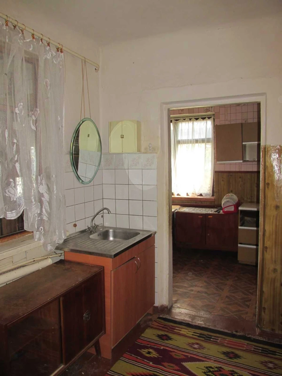 Продам частину будинку по вул. Тітова ( район Дитячої лікарн