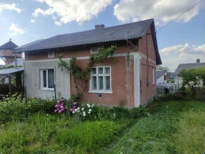 Продаю половину Будинку,цегл гараж та прибуд зем ділянку пл