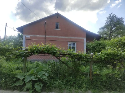 Продаю половину Будинку,цегл гараж та прибуд зем ділянку пл