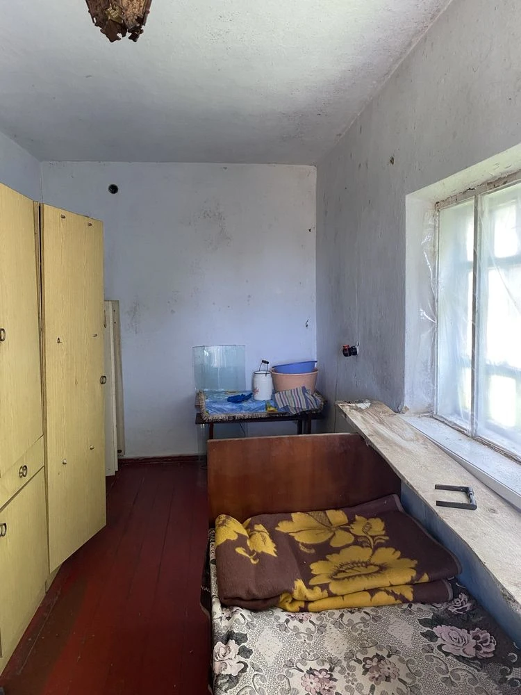 Половина будинку по вул. Автодорівська біля річки