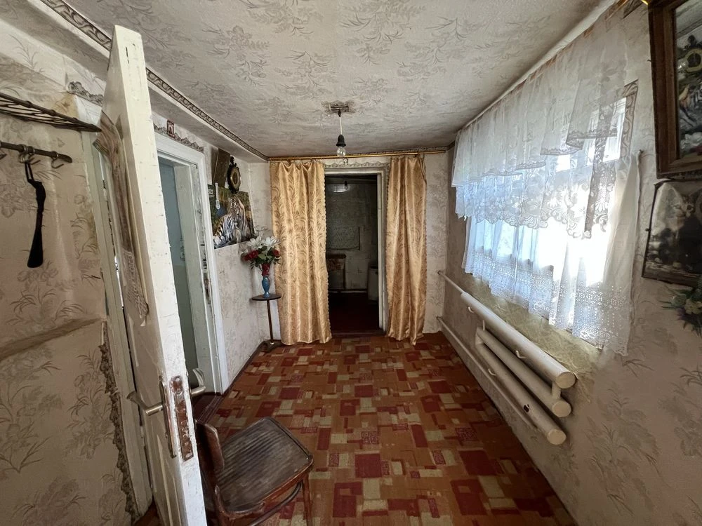 Будинок на скалі біля м-ну Покупайка