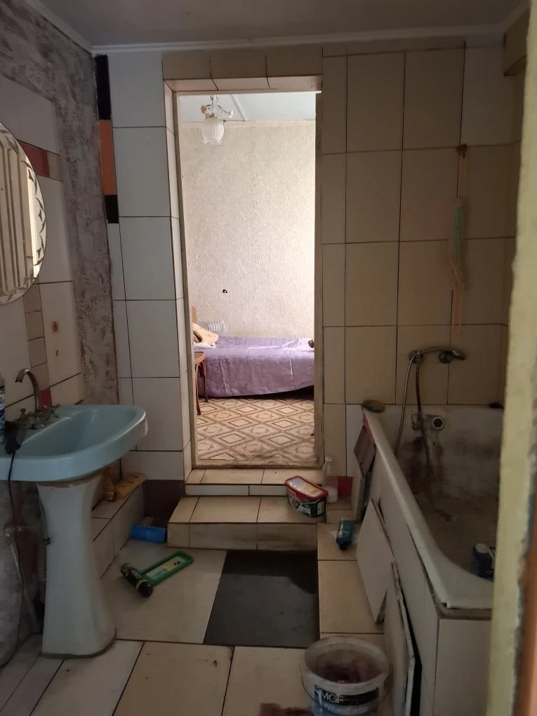 Дом в городе со всеми удобствами, летней кухней и садом!