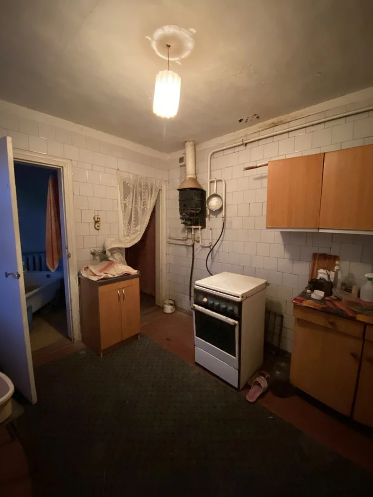 Продам просторий будинок 100 м² в місті  Кобеляки. Газ, зруч
