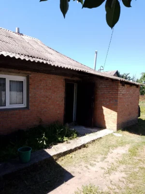 Продам 1/2 будинку із земельною ділянкою та літньою кухнею