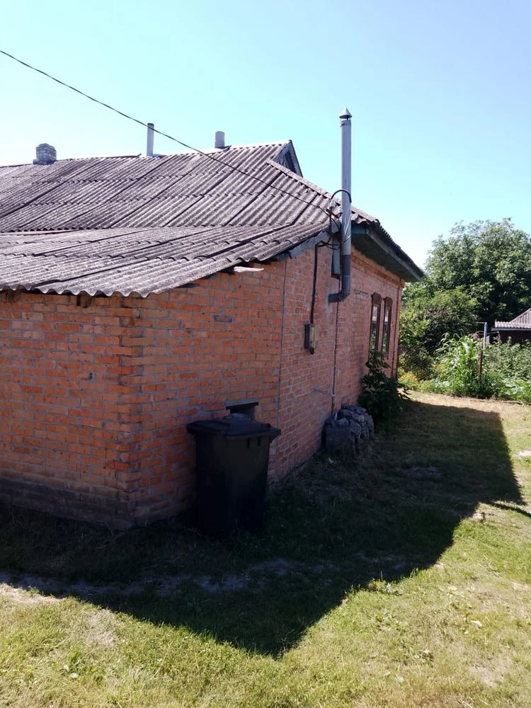 Продам 1/2 будинку із земельною ділянкою та літньою кухнею