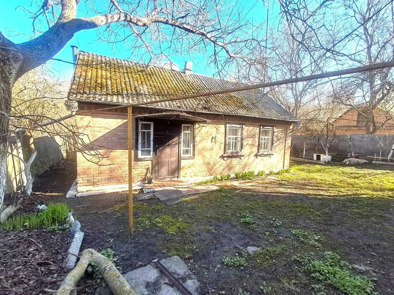 Будинок з гаражом та времянкою. ЛІтня кухня.Свій великий ста