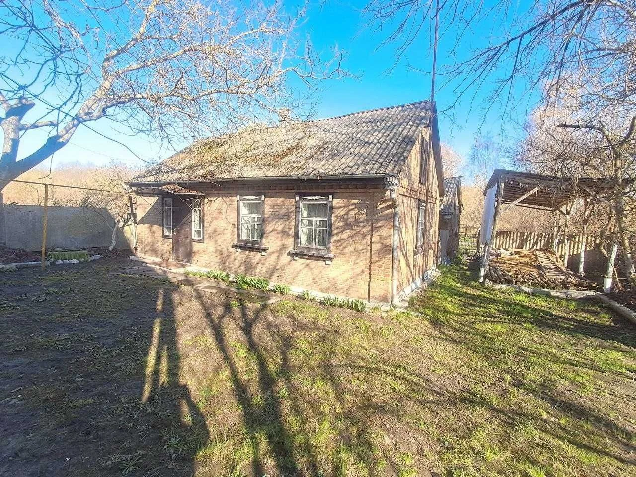 Будинок з гаражом та времянкою. ЛІтня кухня.Свій великий ста