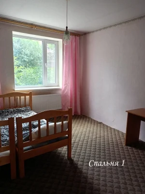 Продам 1/2 частину двоповерхового цегляного будинку.