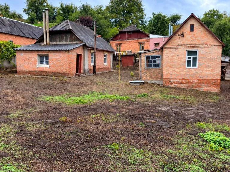Будинок. Ромни, Партизанський Спуск