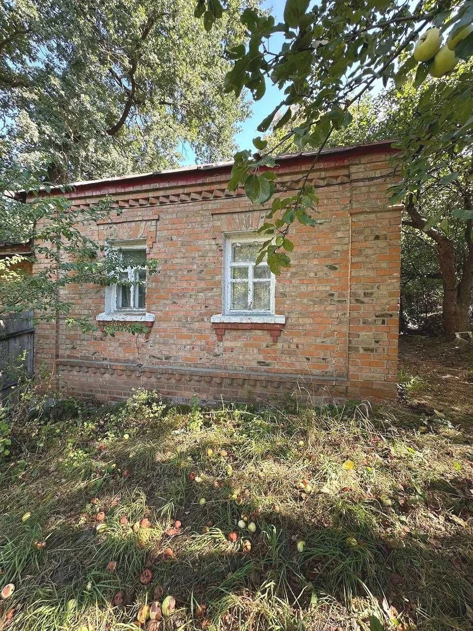 Продам частину будинку 51 м² із ділянкою 10 соток у Ромнах