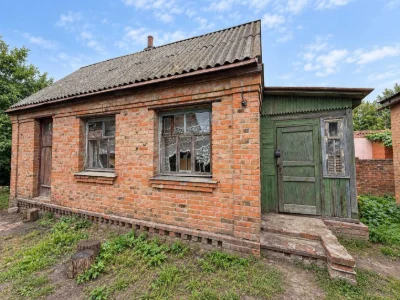 Продам будинок із літньою кухнею та городом — $16 000
