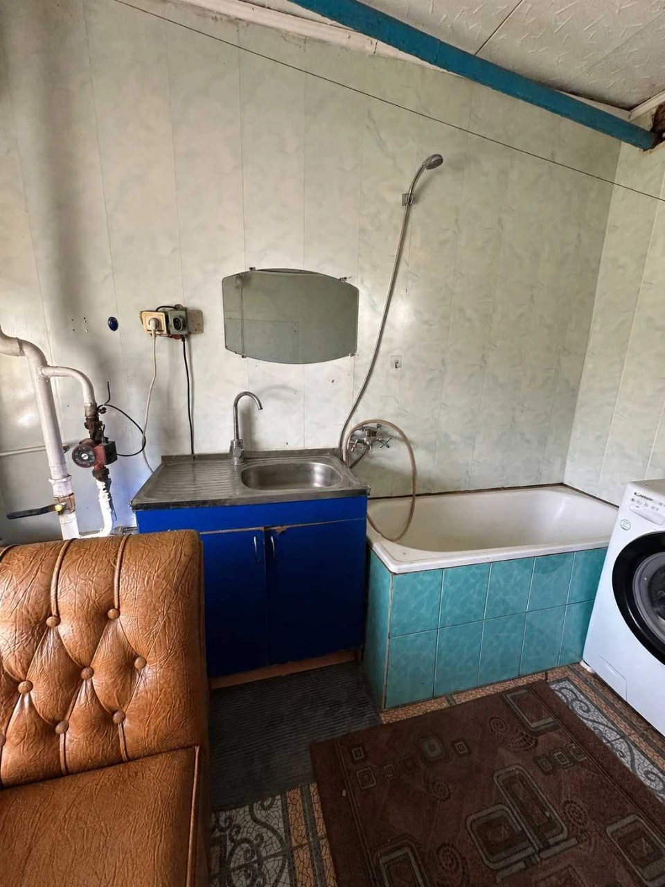 Продам будинок 58 м² із ділянкою та гаражем у Ромнах