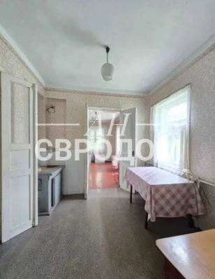 Продам дом 107м2. на две семьи м.Валки