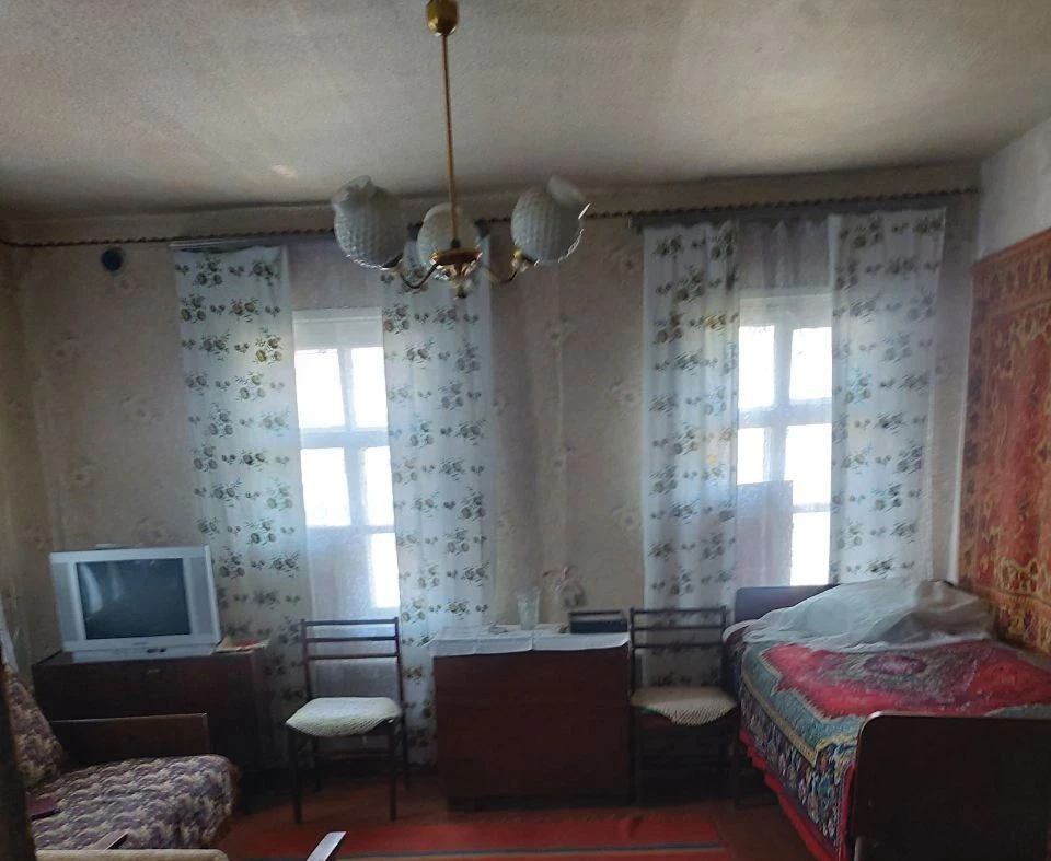 Половина будинку по вул Сумський шлях в місті Дергачі