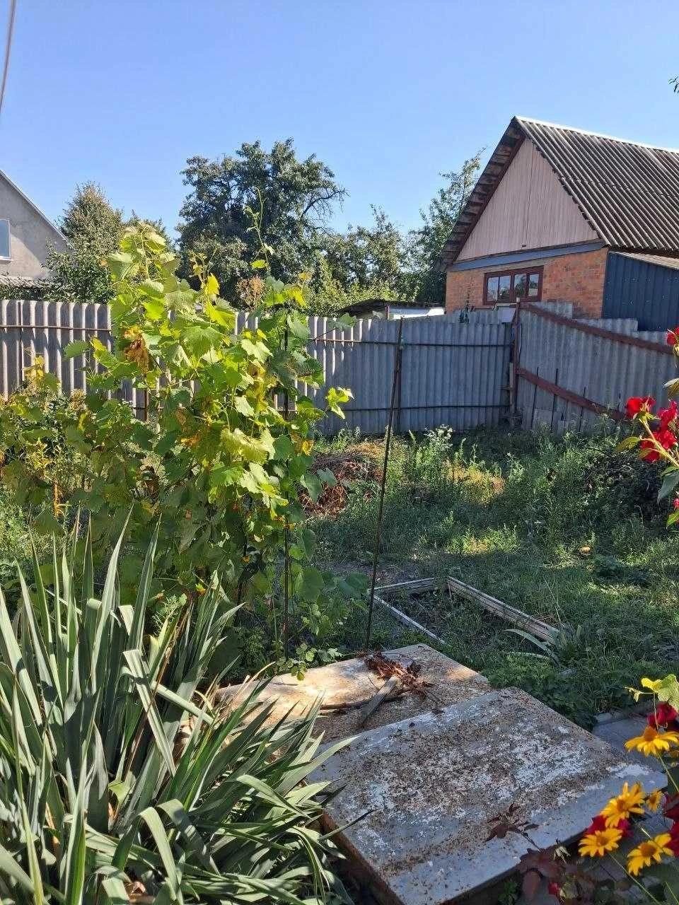 Продаж половини будинку Дергачі район Чудо Маркету