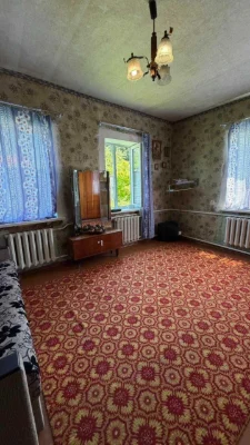 Добротный дом с гаражом и большим участком в Старых Дергачах