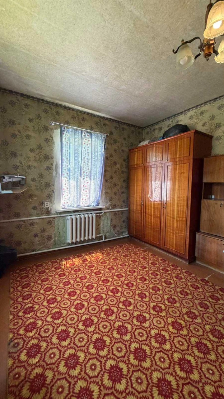 Добротный дом с гаражом и большим участком в Старых Дергачах