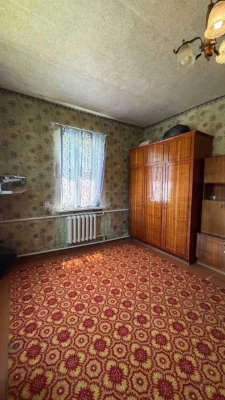Добротный дом с гаражом и большим участком в Старых Дергачах