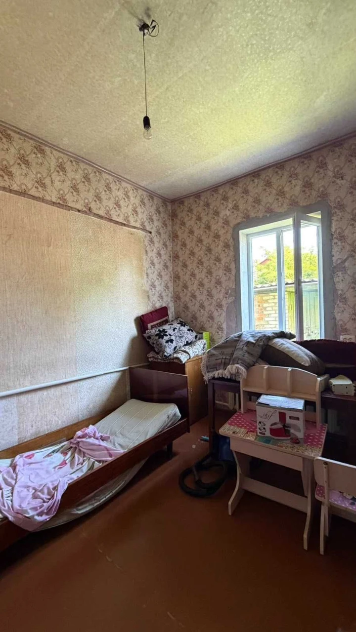Добротный дом с гаражом и большим участком в Старых Дергачах