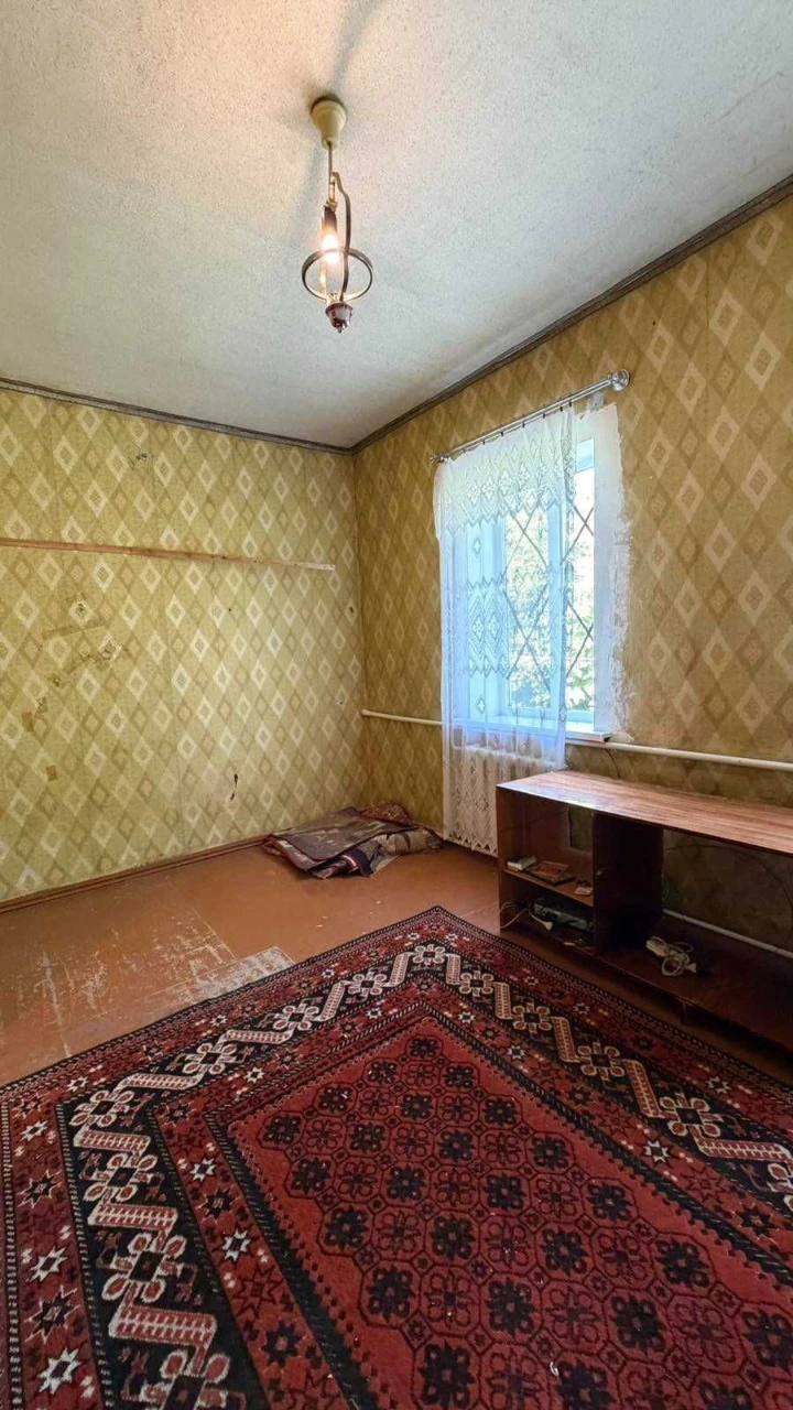 Добротный дом с гаражом и большим участком в Старых Дергачах