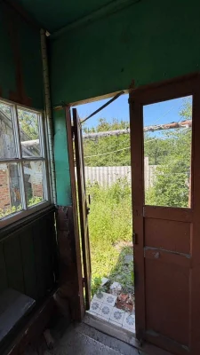 Добротный дом с гаражом и большим участком в Старых Дергачах