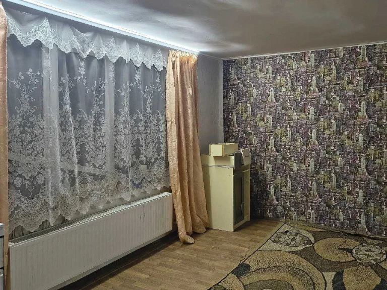 В центрі Чугуєва продам півбудинку