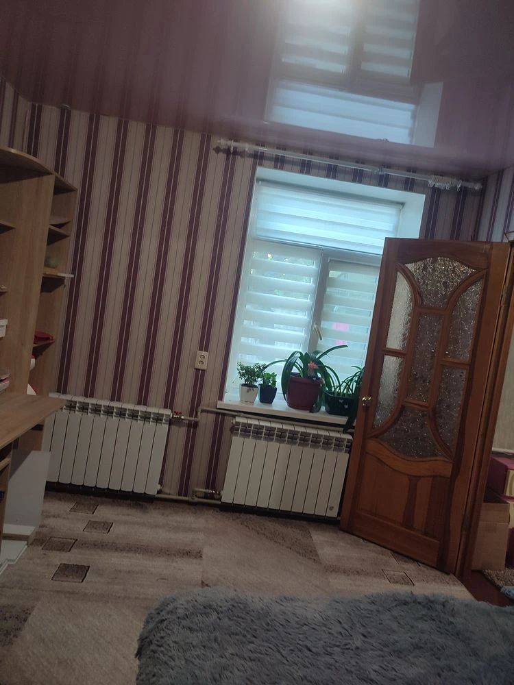 Продам частину будинку в місті Ізюм