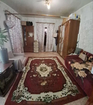 Продам 1\2 частину  будинку в центрі міста Чугуїв!
