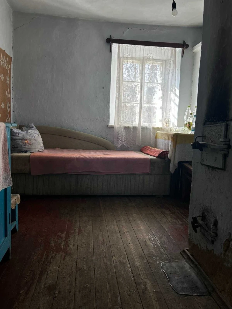 Продається пів будинку в м.Городок.