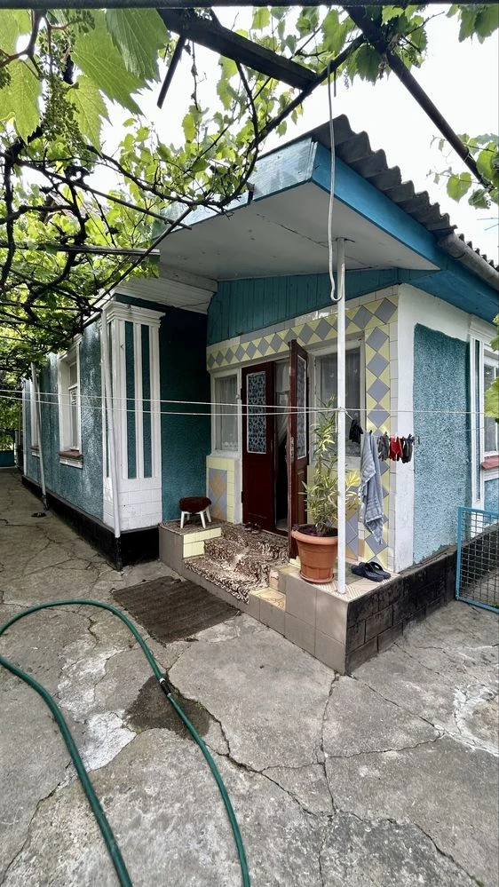 Будинок в тихому місці біля центру