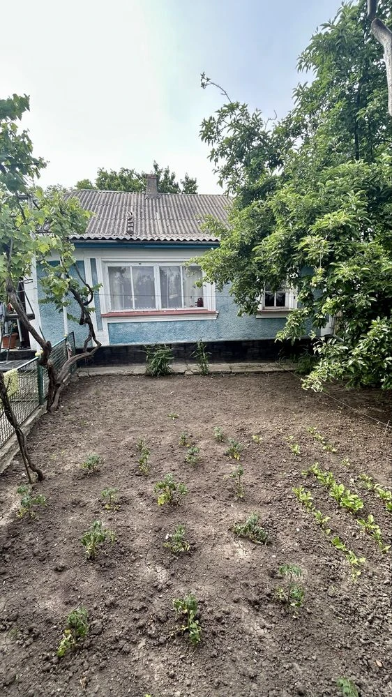 Будинок в тихому місці біля центру