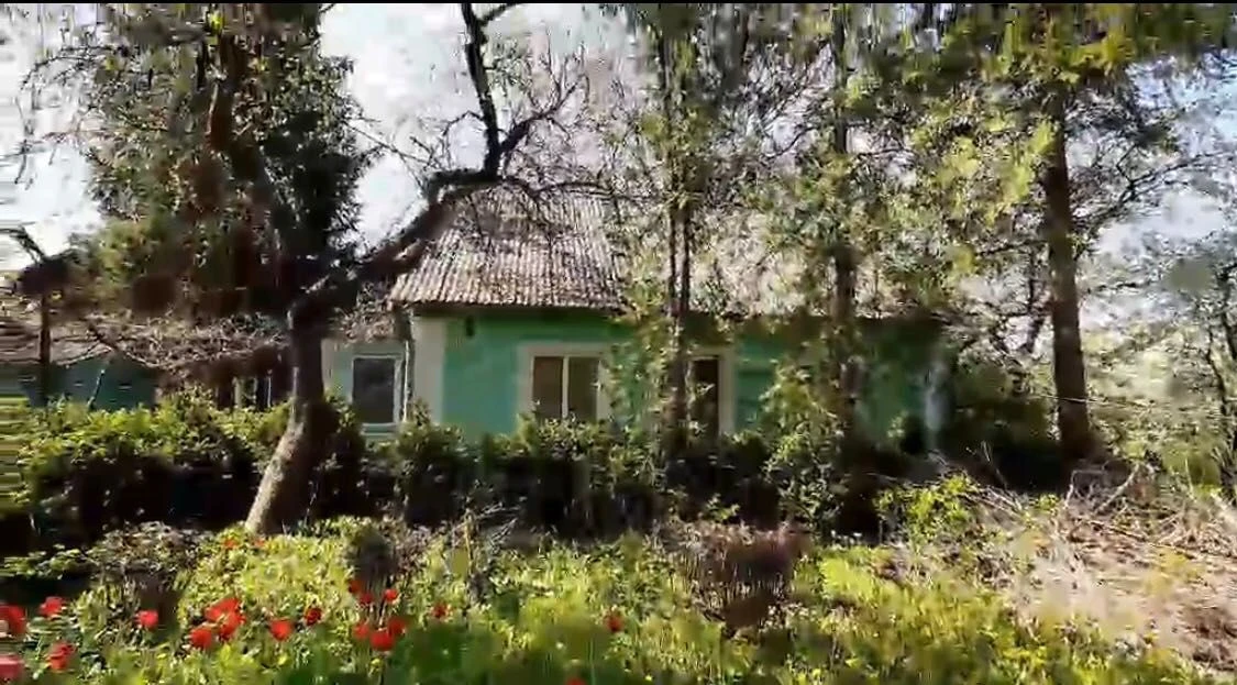 Ексклюзивна земельна ділянка з будинком у центрі міста